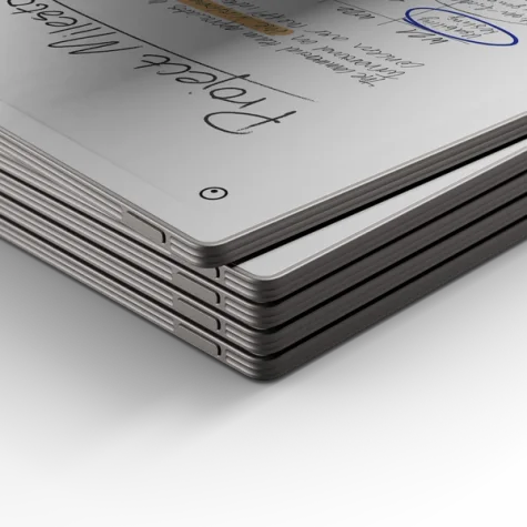 Close-up of five reMarkable Paper Pro's stacked on top of each other.