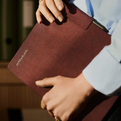 To hands holding a Book Folio