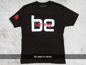 be Strong - Men's Black T-shirt (as seen in mirror)